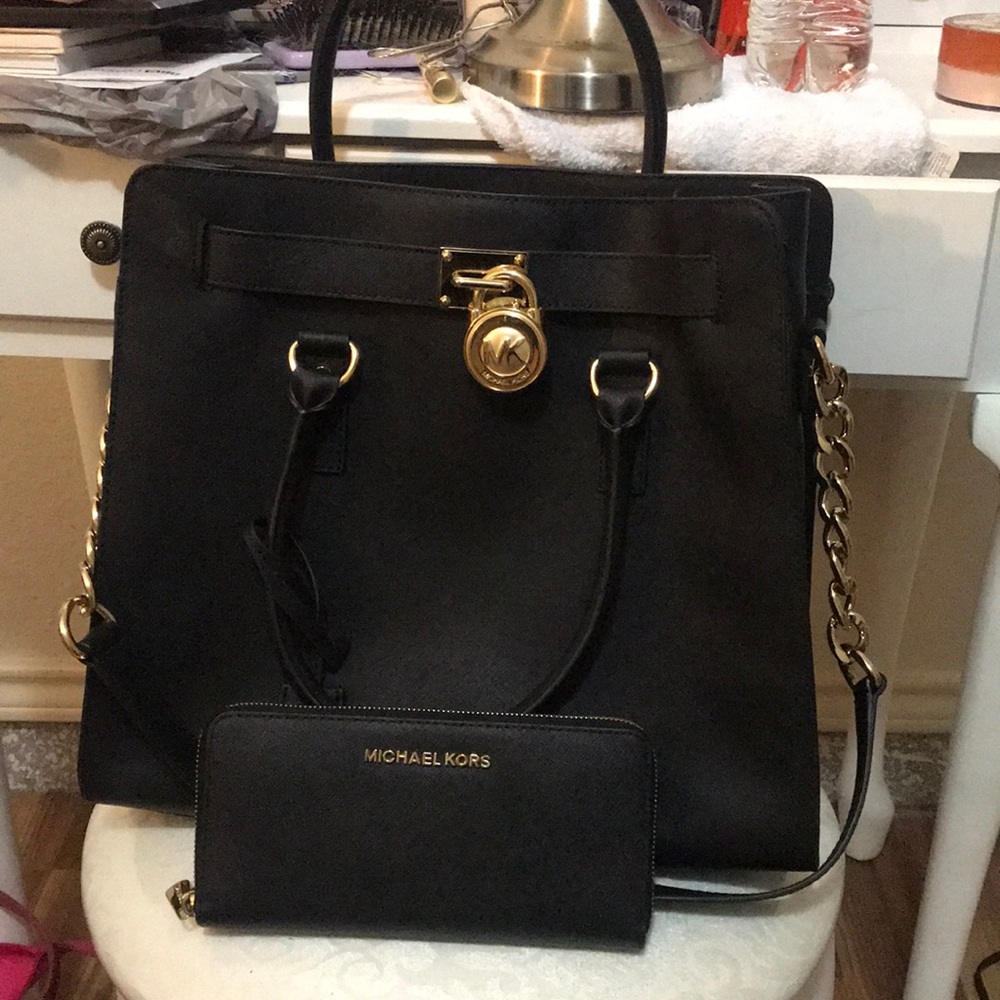 Authentic Micheal Kors purse and wallet